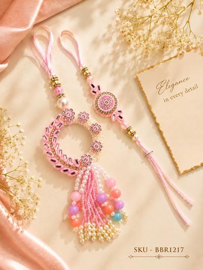 ✨ Pastel Pink Bhai-Bhabhi Rakhi Set with Pearl Tassels ✨