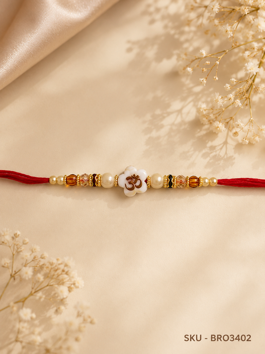 Pearl Floral Om Rakhi