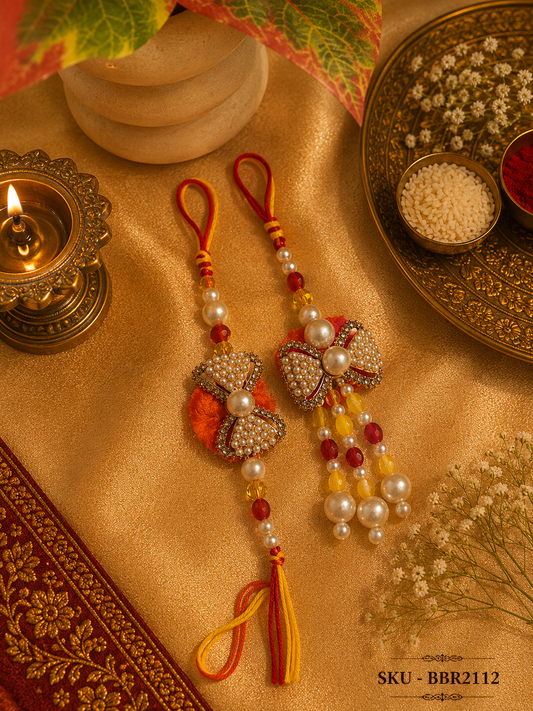 Pearl Bow Bhai Bhabhi Rakhi Set – Orange & Yellow