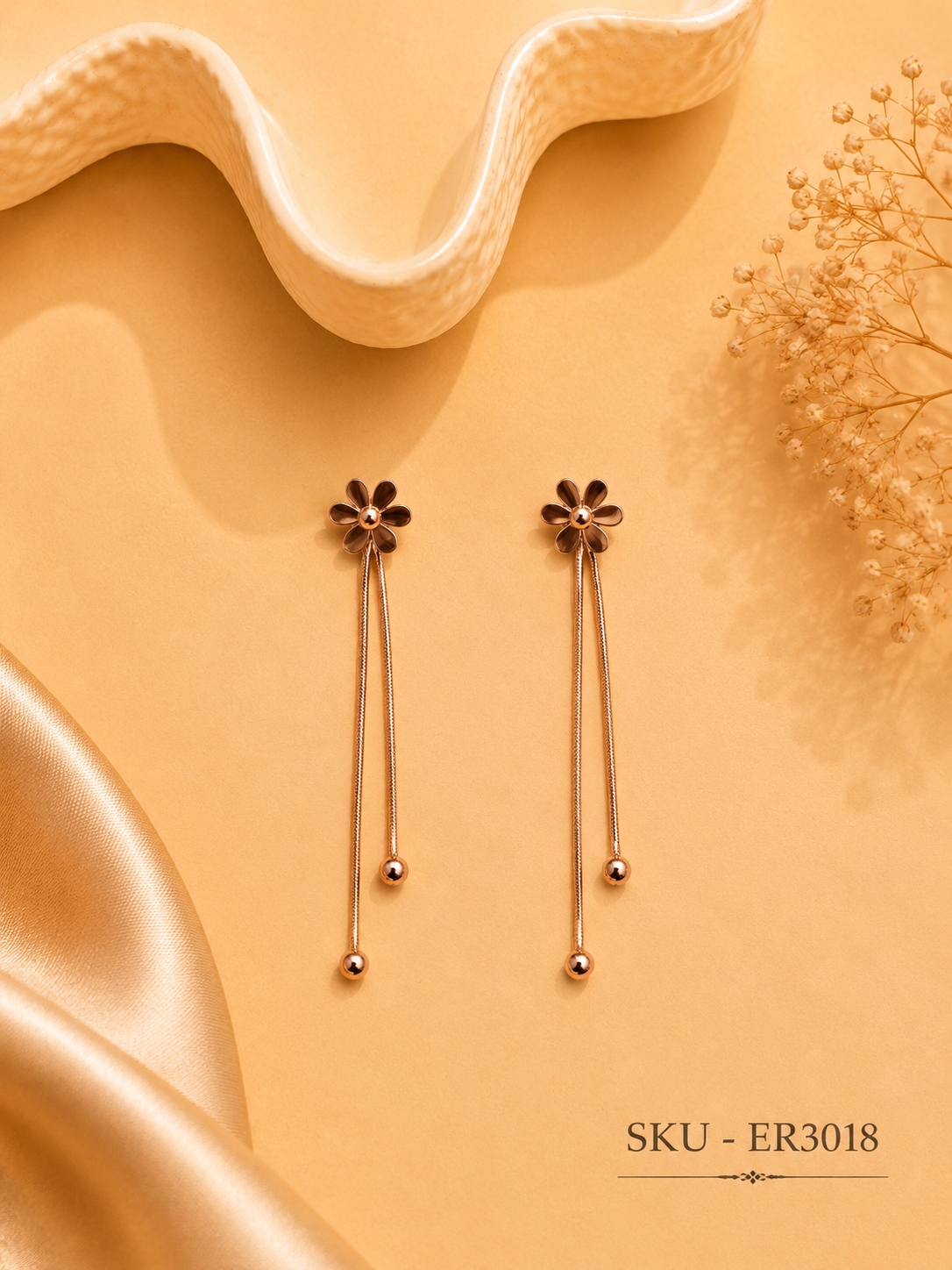 Minimal floral tassel earrings